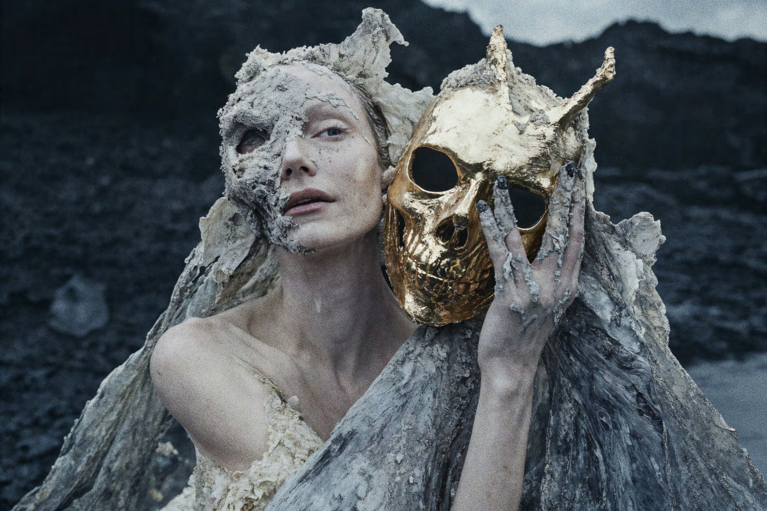 Figure with golden mask