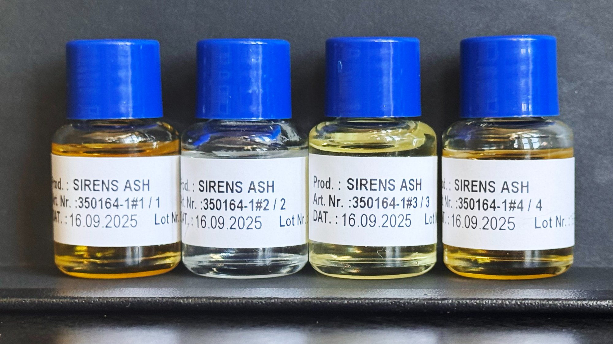 Siren's Ash formulation bottles